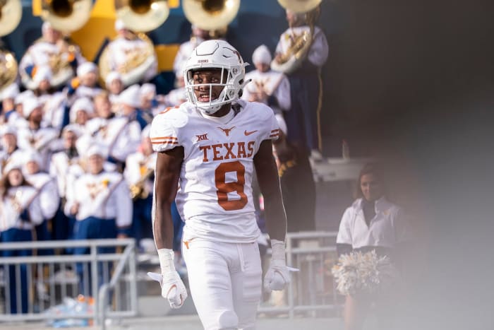 Texas wide receiver Xavier Worthy (8) smiles after scoring a touchdown during the game against West Virginia on Saturday, Nov. 20, 2021. Mlc Ut Wv Football 1106